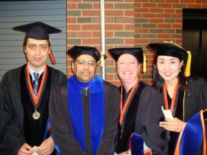 Really, no one looks good in mortarboard. But I was still happy to be getting my Ph.D.